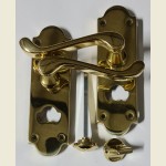 Chrissi Shaped Privacy Door Handles Polished Brass